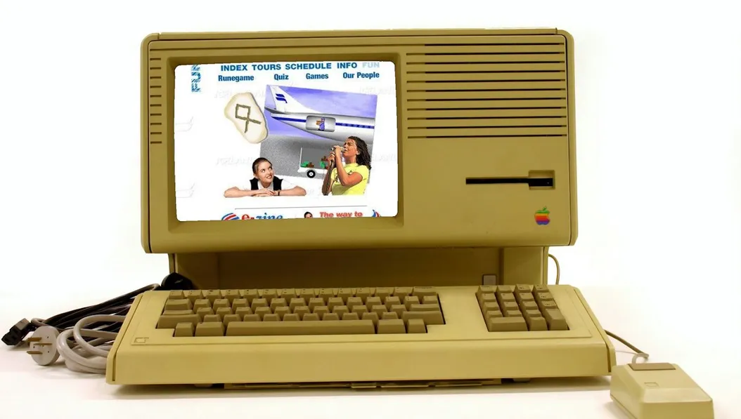 Outdated website homepage on an obsolete computer, representing the need for conversion optimization on flight school website homepages